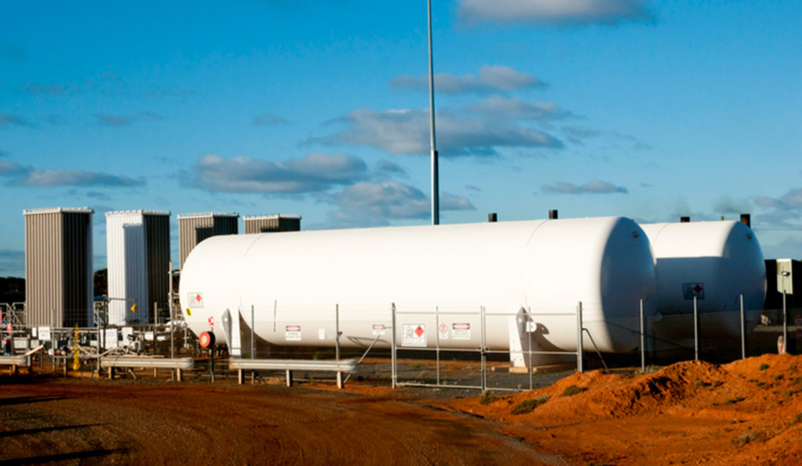 Above ground tankers at a mining site.